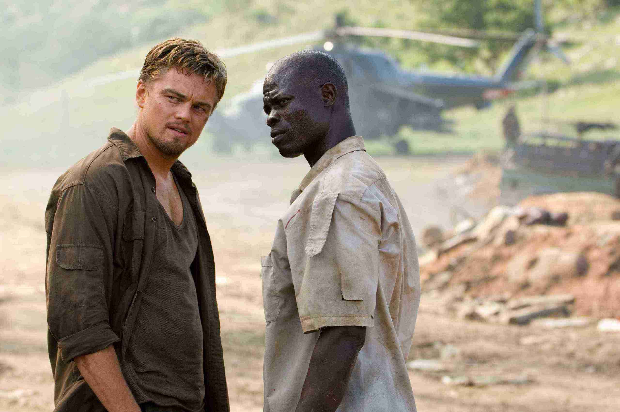 LEONARDO DiCAPRIO stars as Danny Archer and DJIMON HOUNSOU stars as Solomon Vandy in Warner Bros. Pictures' and Virtual Studios' action drama "Blood Diamond," distributed by Warner Bros. Pictures. PHOTOGRAPHS TO BE USED SOLELY FOR ADVERTISING, PROMOTION, PUBLICITY OR REVIEWS OF THIS SPECIFIC MOTION PICTURE AND TO REMAIN THE PROPERTY OF THE STUDIO. NOT FOR SALE OR REDISTRIBUTION.